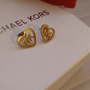 Gold mk stud earrings